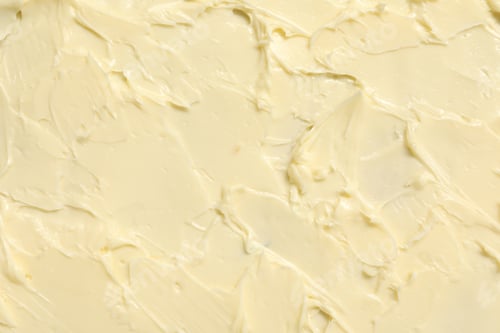 Preview: Texture of fresh natural butter as background, top view