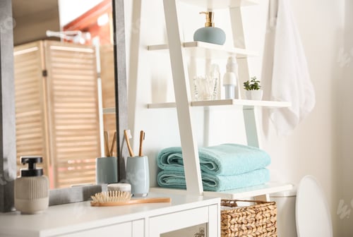 Preview: Fresh towels on decorative ladder in modern bathroom