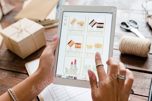 Preview: Female hand over touchpad screen going to choose cosmetic products