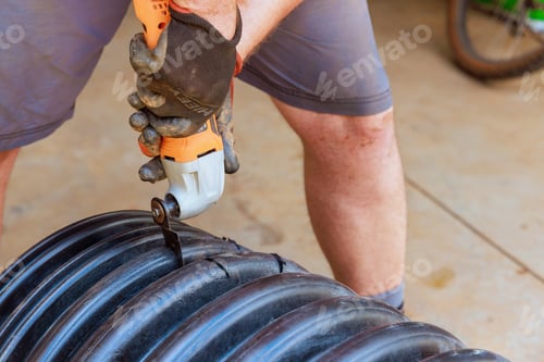 Preview: Making hole in a black plastic polypropylene sanitary pipe so that another pipe can be connected