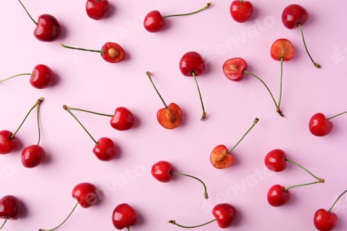 Preview: Ripe red cherries on color background, top view