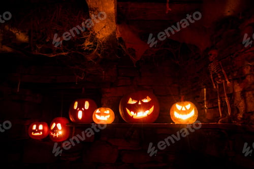 Preview: scary Halloween background with Jack'o'lanterns and skeleton