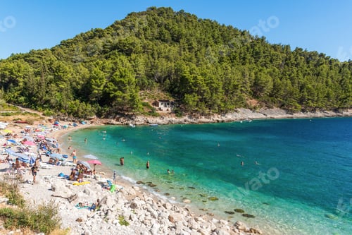 Preview: People on beach in Pupnatska luka cove on Korcula island, Croatia