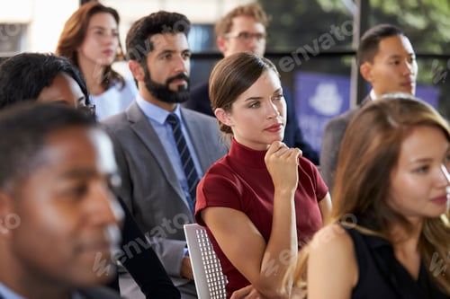 Preview: Audience at a business seminar listening to a speaker