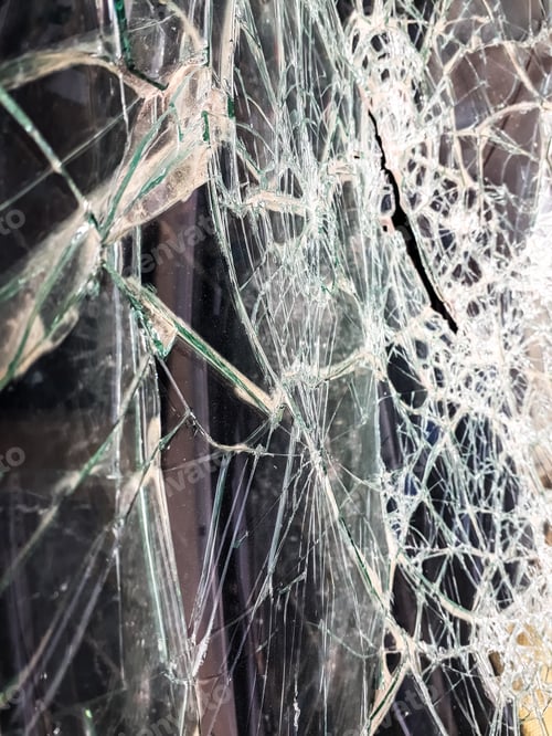 Preview: Car windshield shattered with stones by vandals.