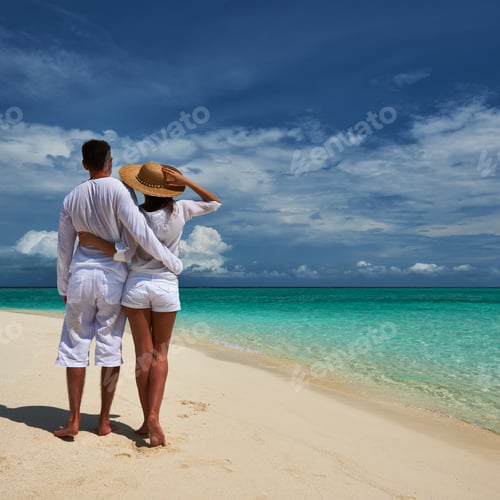 Preview: Couple On A Tropical Beach At Maldives