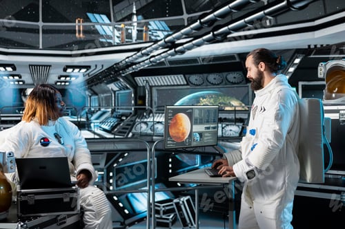 Preview: Cosmonaut running data analysis on monitor before Mars expedition