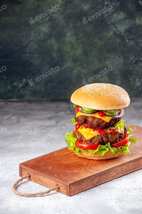 Preview: Homemade tasty sandwich on wooden board tied up with rope on blurred background with free space