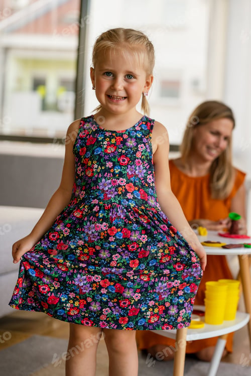 Preview: Portrait of beautiful little girl having fun and smiling at home or in kindergarten