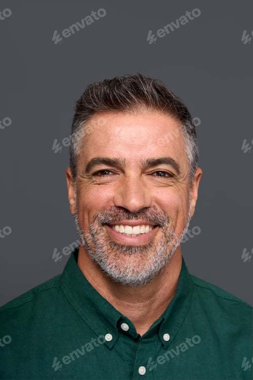 Preview: Happy middle aged business man isolated on gray. Vertical portrait.