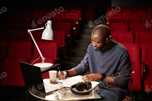 Preview: Theater Director Reading Script