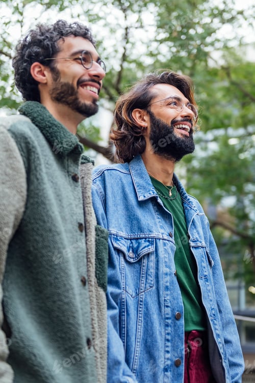 Preview: couple of gay men walking smiling