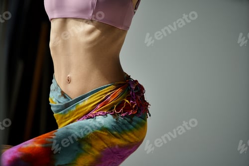 Preview: Vibrant Woman Posing in Tie-Dyed Skirt