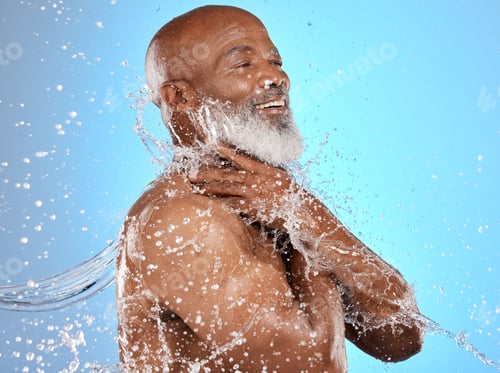 Preview: Beauty, water and cleaning splash of senior man for body care, hygiene and health lifestyle. Happy,