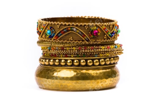 Preview: stack of golden bracelets