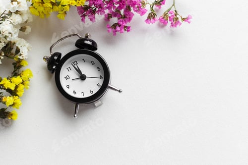 Preview: Spring Time Change Background with alarm clock and flower branches