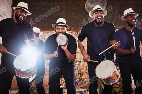 Preview: Get up and get dancing. Portrait of a group of musical performers playing together.