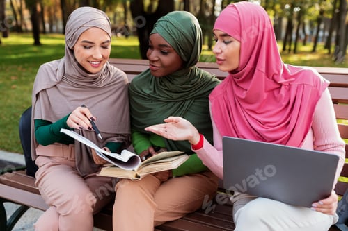 Preview: Group Of Modern Muslim Students Ladies Learning Reading Books Outside