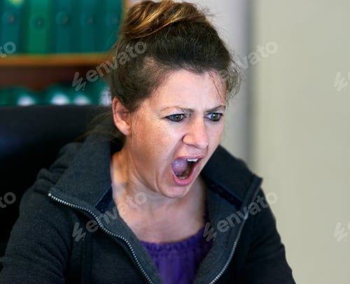 Preview: I cant believe this. Cropped shot of an angry woman yelling in anger.