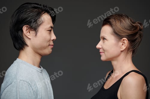 Preview: Couple Standing against Grey Background