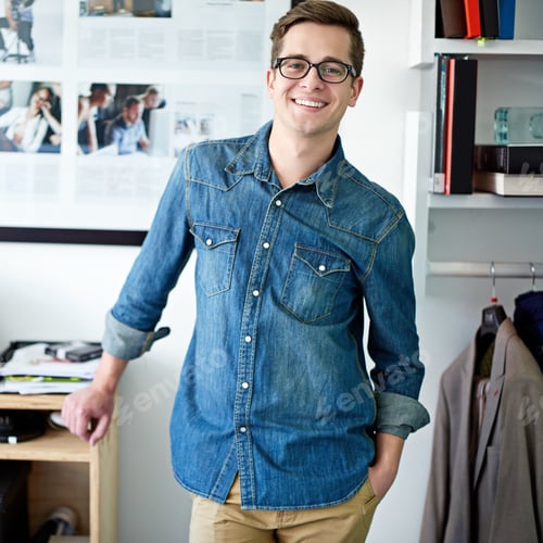 Preview: Success has been a lot of fun. Portrait of a young male designer standing in the office.