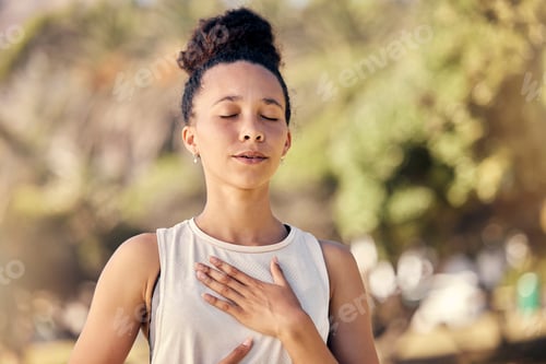 Preview: Yoga, meditation and fitness with a black woman breathing for calm exercise outdoor in a nature par