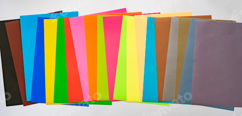 Preview: various sheets of color paper mix flat lay abstract background