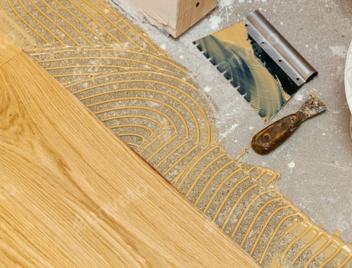 Preview: Parquet installation with gluing and professional tools.