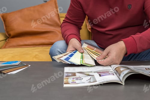 Preview: Male designer at his desk