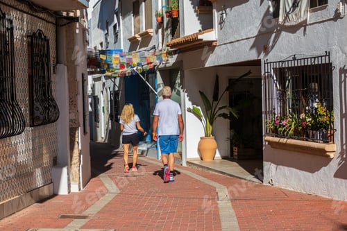 Preview: Shot of tourist walking in the downtown