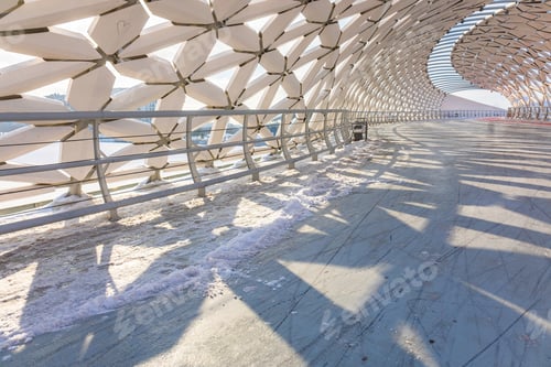 Preview: Modern architectural urbanistic Atyrau fish bridge across Ishim river. Pedestrian bridge with