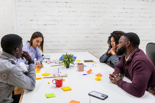 Preview: Marketing professionals brainstorming during creative meeting in coworking space