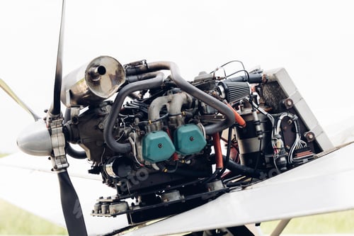Preview: Engine maintenance service. Uncovered engine small plane on a pedestal.
