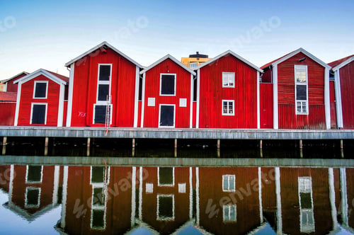 Preview: Beautiful shot of red buildings near the water
