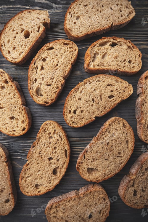 Preview: Artisan sliced bread on wooden surface