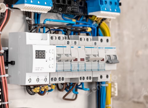 Preview: Switchboard with many switches and fiber optic cables.