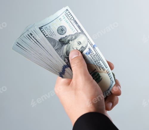 Preview: Man with dollar bills on light background, closeup