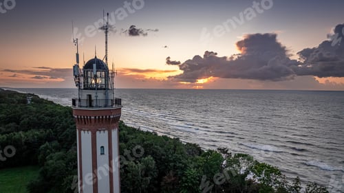 Preview: Light beam from lighthouse in Poland by Baltic Sea.