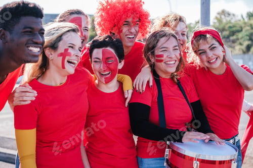 Preview: Group of fans celebrating the successes of their team have fun together