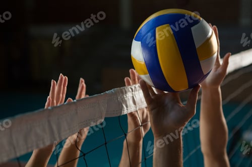 Preview: Cropped hands of players practicing volleyball