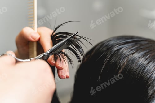 Preview: Close up of hands that holding scissors