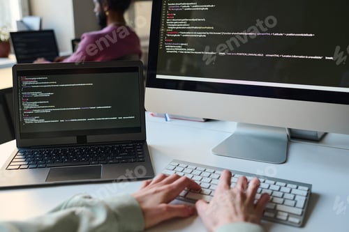 Preview: Programmer typing codes for computer program