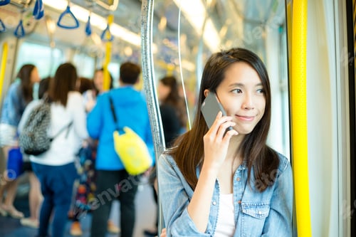 Preview: Woman talk to cellphone in train
