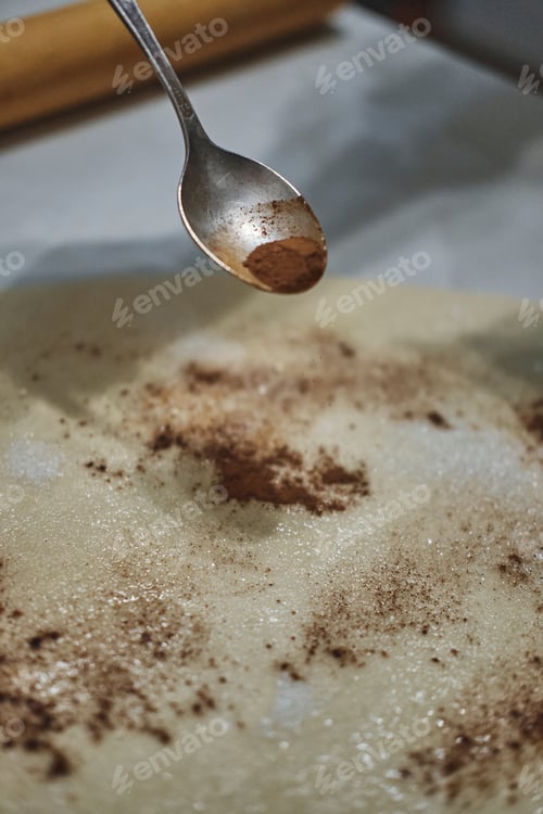Preview: Adding Cinnamon To Dough With Spoon For Baking