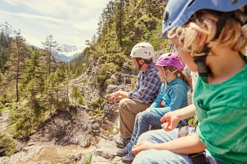 Preview: Father and children enjoying view on hill, Ehrwald, Tyrol, Austria