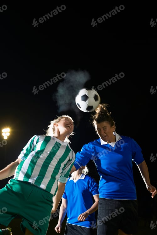 Preview: Female soccer players hitting ball with head