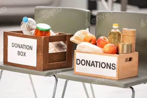 Preview: Donation boxes with food products on chairs indoors