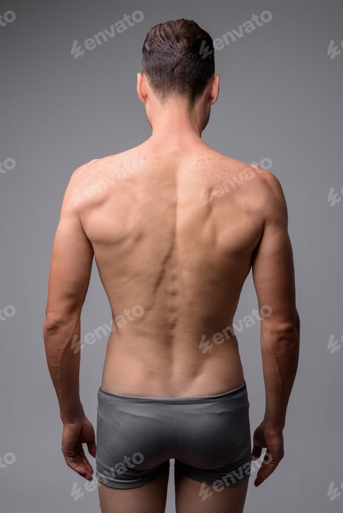 Preview: Studio shot of handsome muscular man shirtless