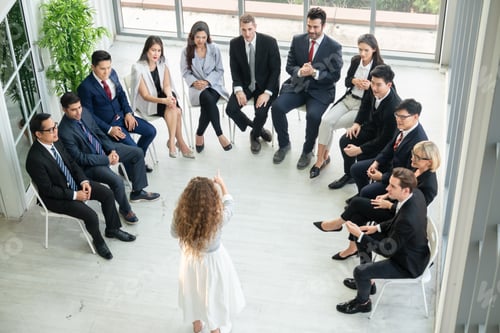Preview: Business people at a seminar