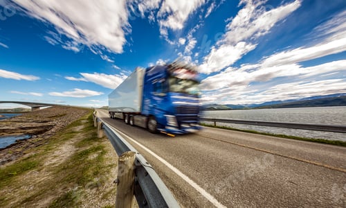 Preview: Truck rushes down the highway in the background Atlantic Ocean R